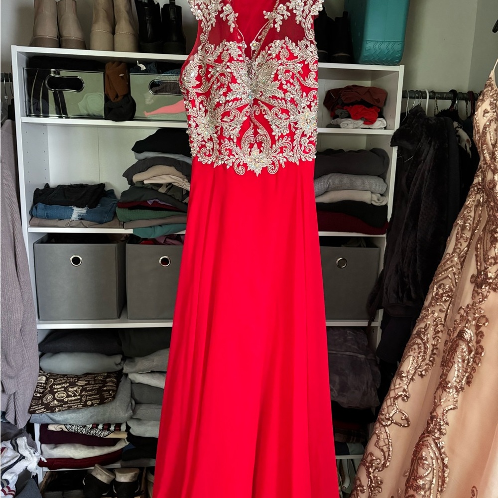 Elegant Red Evening Gown with Intricate Silver Detailing